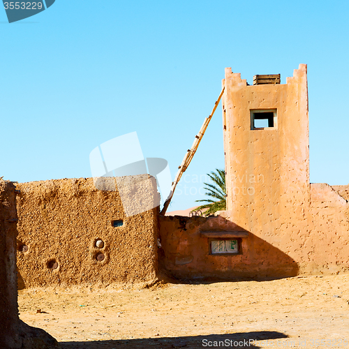 Image of sahara      africa in morocco  palm the old contruction and  his