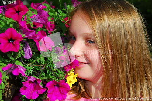 Image of Young girl with flowers