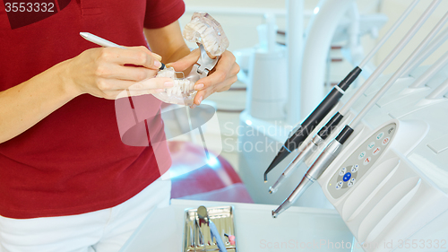 Image of hands of dentist