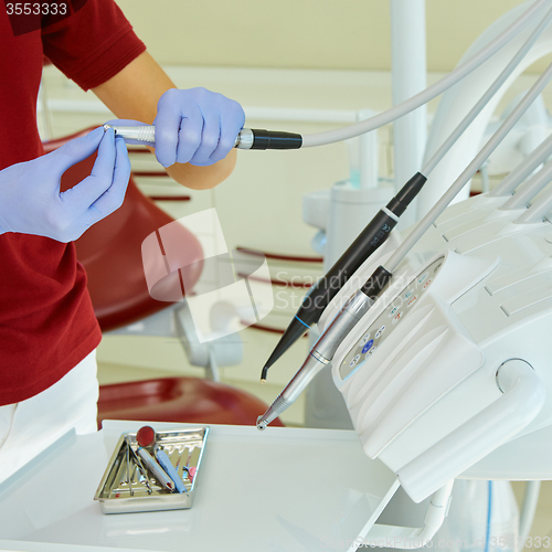 Image of hands of dentist