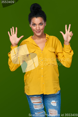 Image of Woman showing eight fingers