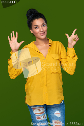 Image of Woman showing seven fingers