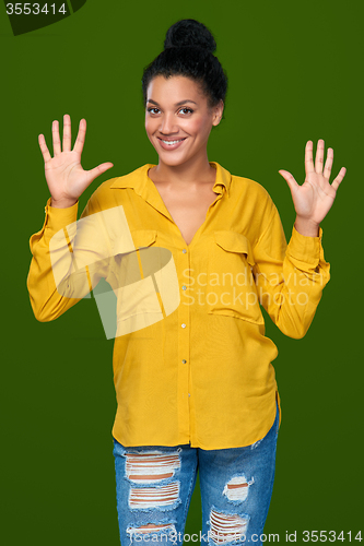 Image of Woman showing ten fingers