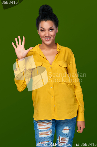 Image of Woman showing five fingers