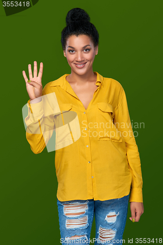 Image of Woman showing four fingers