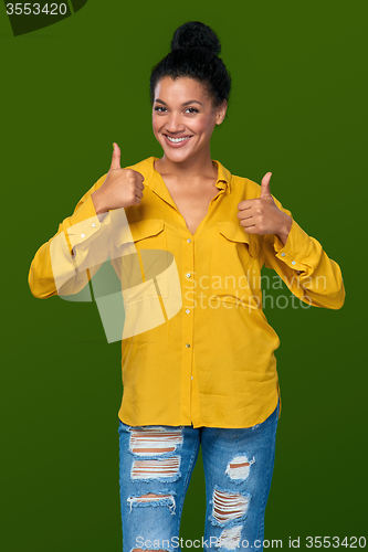 Image of Woman showing thumbs up