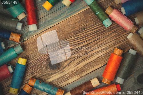 Image of Vintage spools with multi colored threads