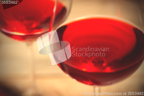 Image of red wine in two goblets