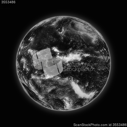 Image of Pacific Ocean on dark planet Earth