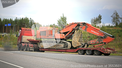 Image of Volvo FH16 Hauls Hitachi Zaxis Excavator