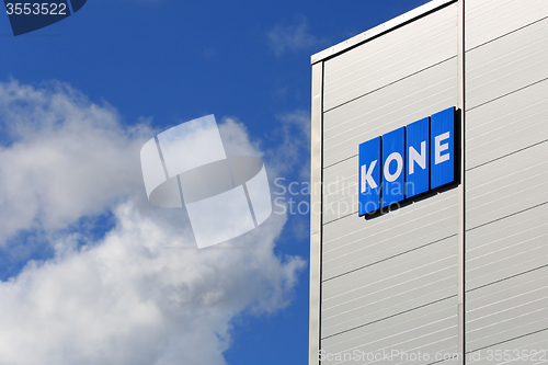 Image of KONE Building with Signage and Blue Sky Clouds