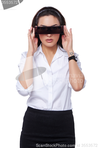 Image of Beautiful business woman with futuristic glasses