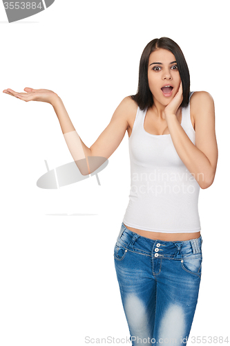 Image of Smiling teen girl showing open hand palm with copy space