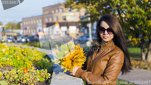 Image of Sonia in downtown with flowers in 2014