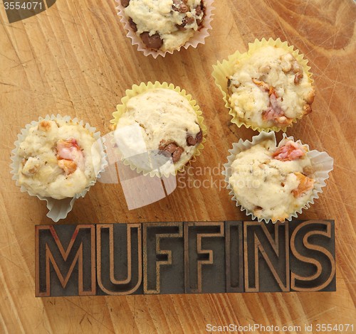 Image of fruit and nut muffins with word