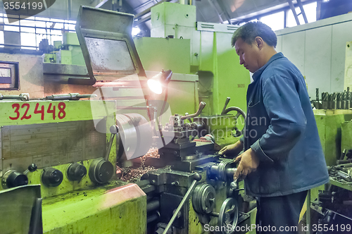 Image of Milling-machine operator works at machine