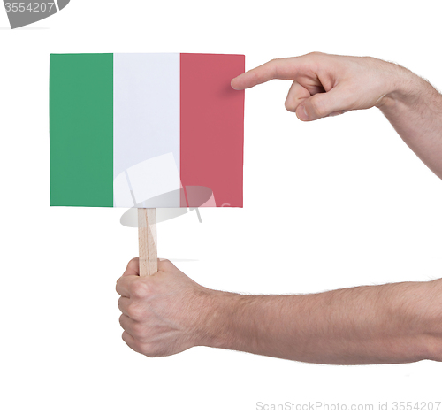 Image of Hand holding small card - Flag of Italy