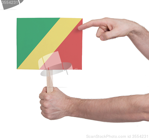 Image of Hand holding small card - Flag of Congo