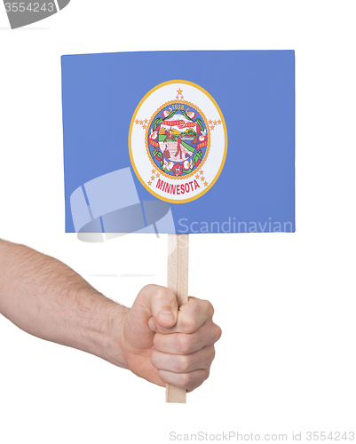 Image of Hand holding small card - Flag of Minnesota