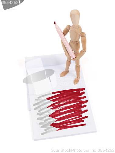 Image of Wooden mannequin made a drawing - Bahrain