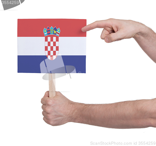 Image of Hand holding small card - Flag of Croatia