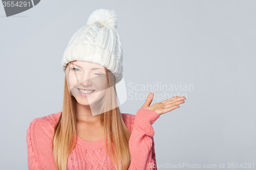 Image of Winter woman winking at you