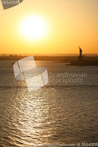 Image of Liberty statue and sunset