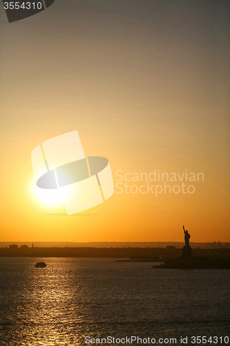 Image of Statue of Liberty and sunset