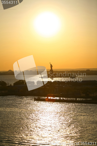 Image of Liberty Statue and sunset in New York