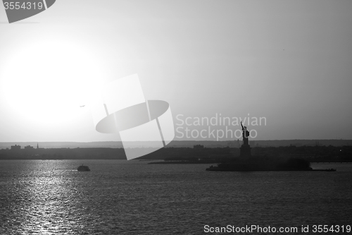 Image of Panoramic view of city and Liberty Statue bw