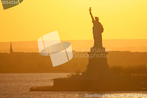 Image of Liberty Statue at sunset