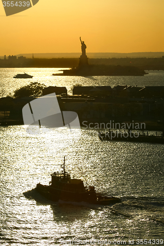 Image of Boats sailing next to Libery Statue