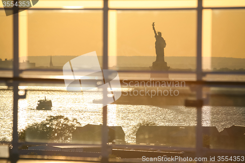 Image of View of Liberty Statue through glass fence