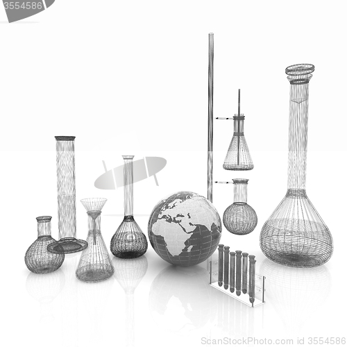 Image of Chemistry set, with test tubes, and beakers filled with colored 