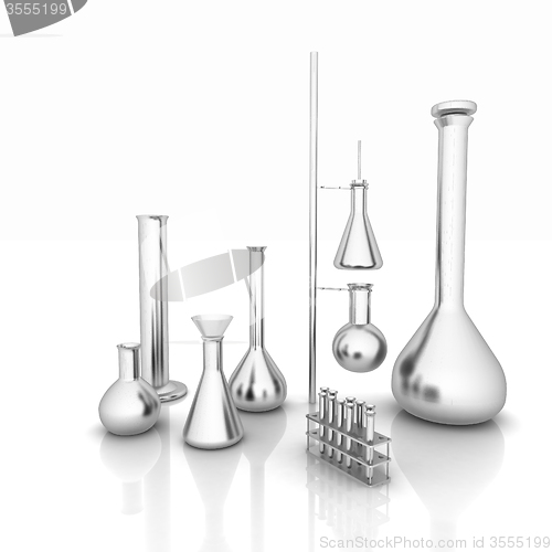 Image of Chemistry set, with test tubes, and beakers filled with colored 