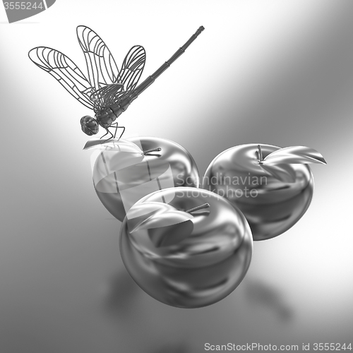 Image of Dragonfly on gold apples