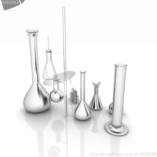 Image of Chemistry set, with test tubes, and beakers filled with colored 