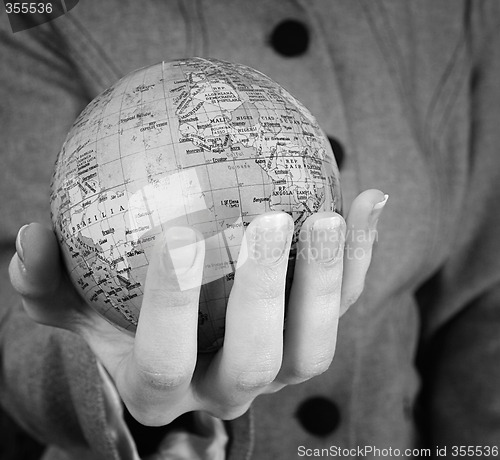 Image of Globe in a girl's hands