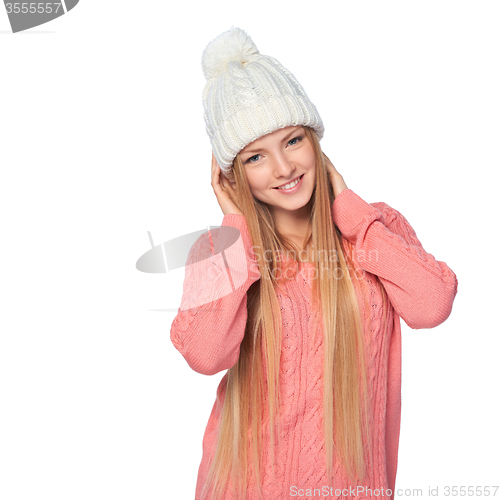 Image of Woman wearing woolen hat and sweater