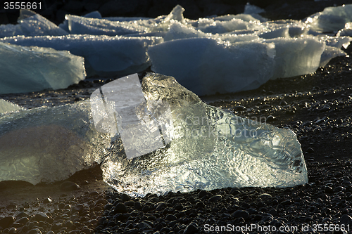 Image of Ice blocks at glacier lagoon Jokulsarlon, Iceland in evening lig
