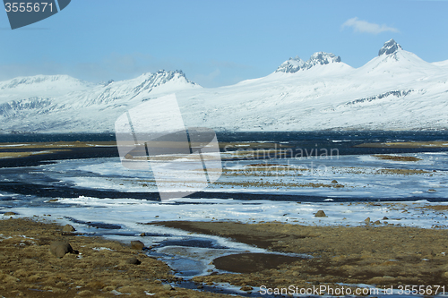 Image of Snow-covered volcanic mountain landscape