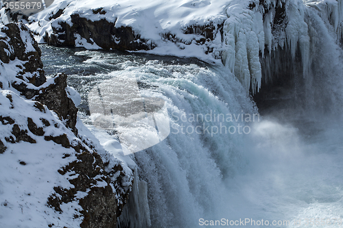 Image of Closeup of frozen waterfall Godafoss, Iceland