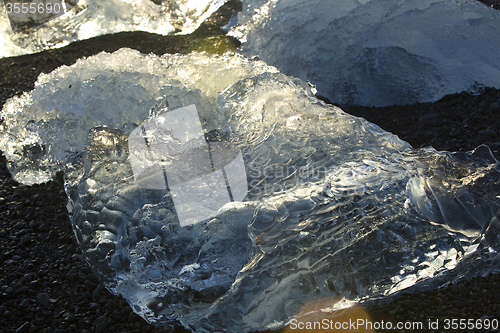 Image of Ice blocks at glacier lagoon Jokulsarlon, Iceland in evening lig