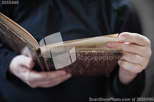 Image of man with vintage book