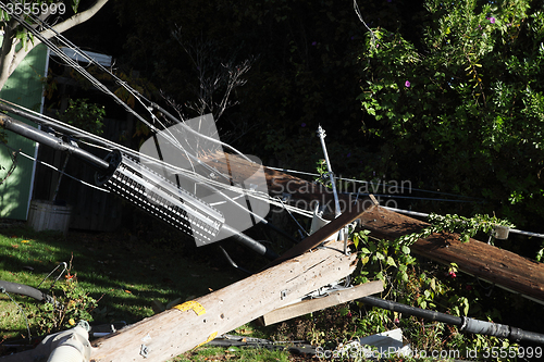 Image of power poles after auto crash