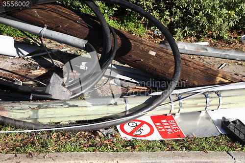 Image of phone and light pole after accident