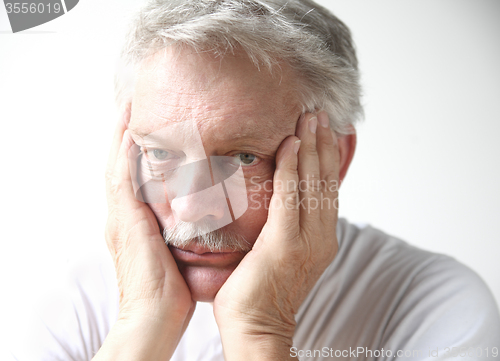 Image of man looking bored	