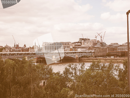 Image of Retro looking Blackfriars bridge in London