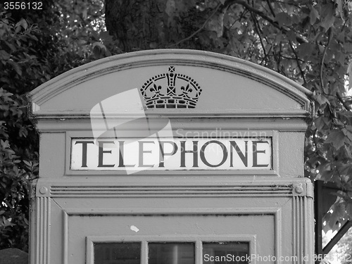 Image of Black and white Red phone box in London