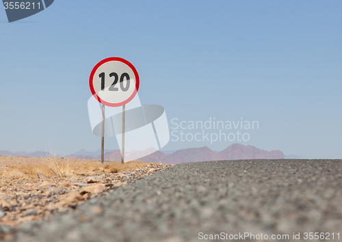 Image of Speed limit sign at a desert road in Namibia